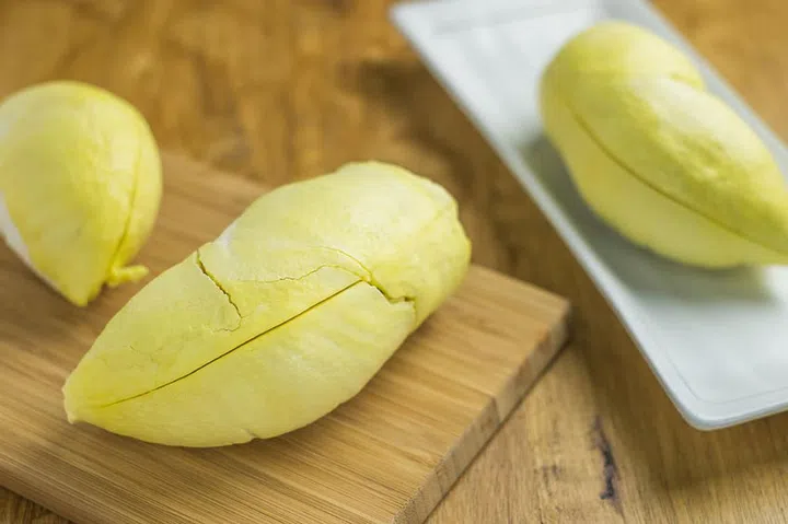 42480663 - yellow durian on wood table