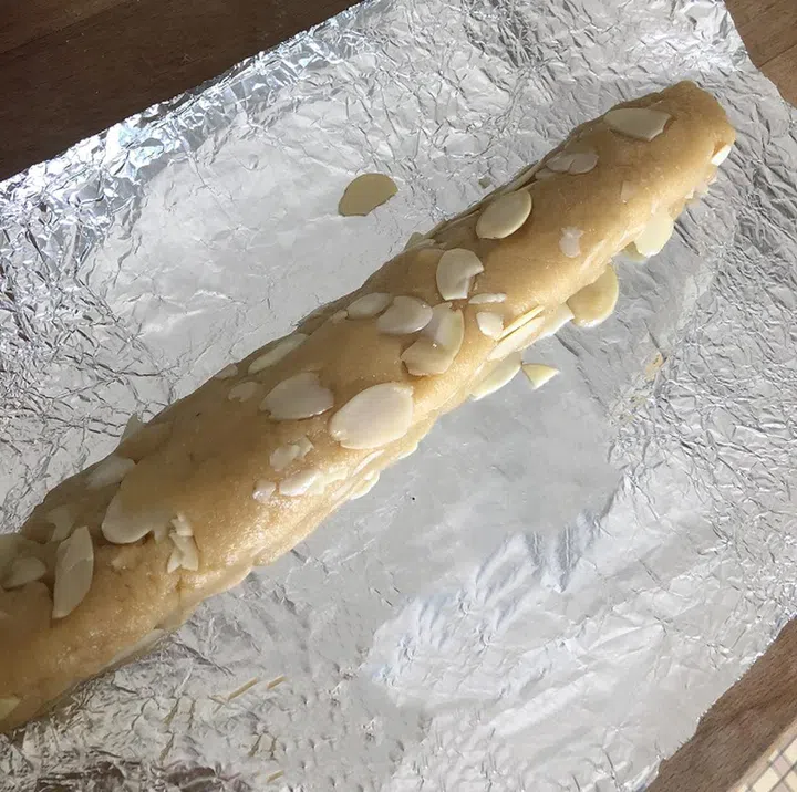 06. Roll flavoured dough into a “log”. Wrap in foil and plastic wrap. Chill for an hour in the fridge, or overnight. You can even freeze the dough, for later use, if you prefer.
