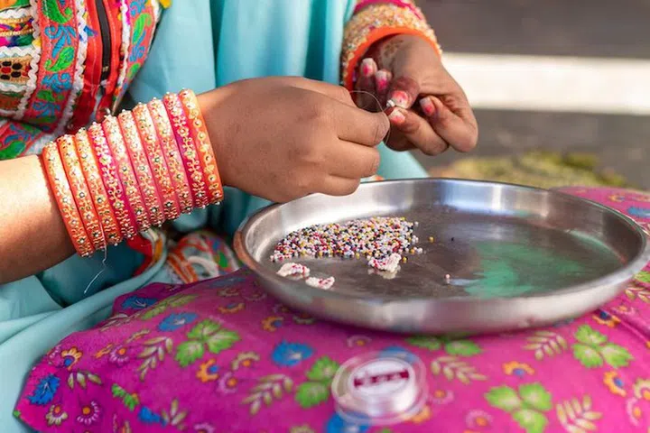 Bead weavers in Gujarat, India.