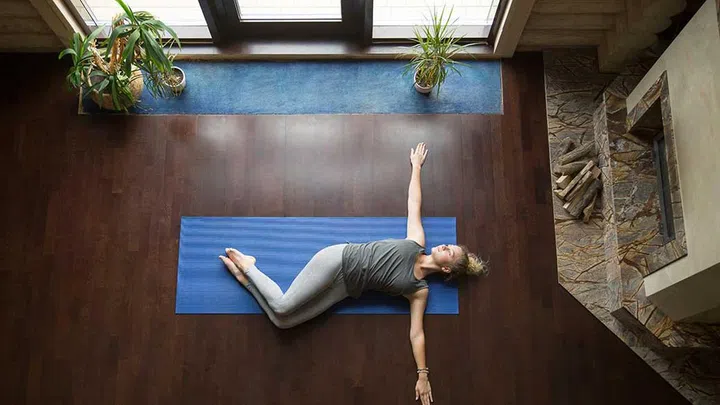Go for a supine twist while lying down to improve your digestion.