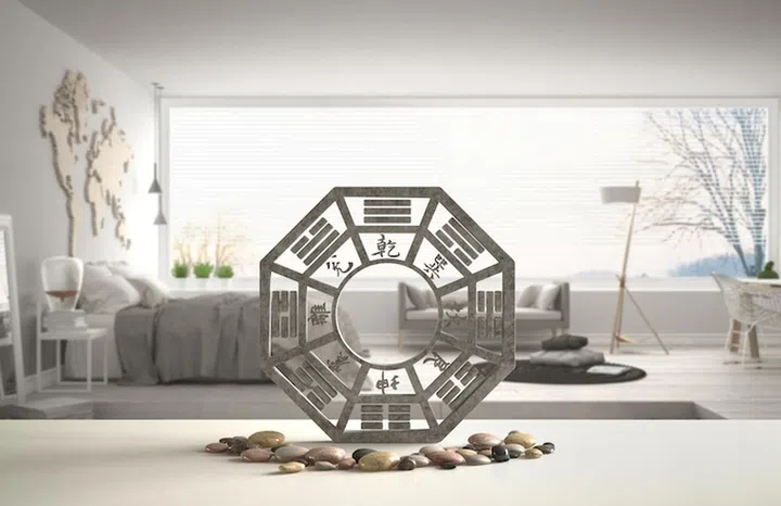White table shelf with bagua and pebble stone, white scandinavian bedroom with big panoramic window, zen concept interior design, feng shui template idea background