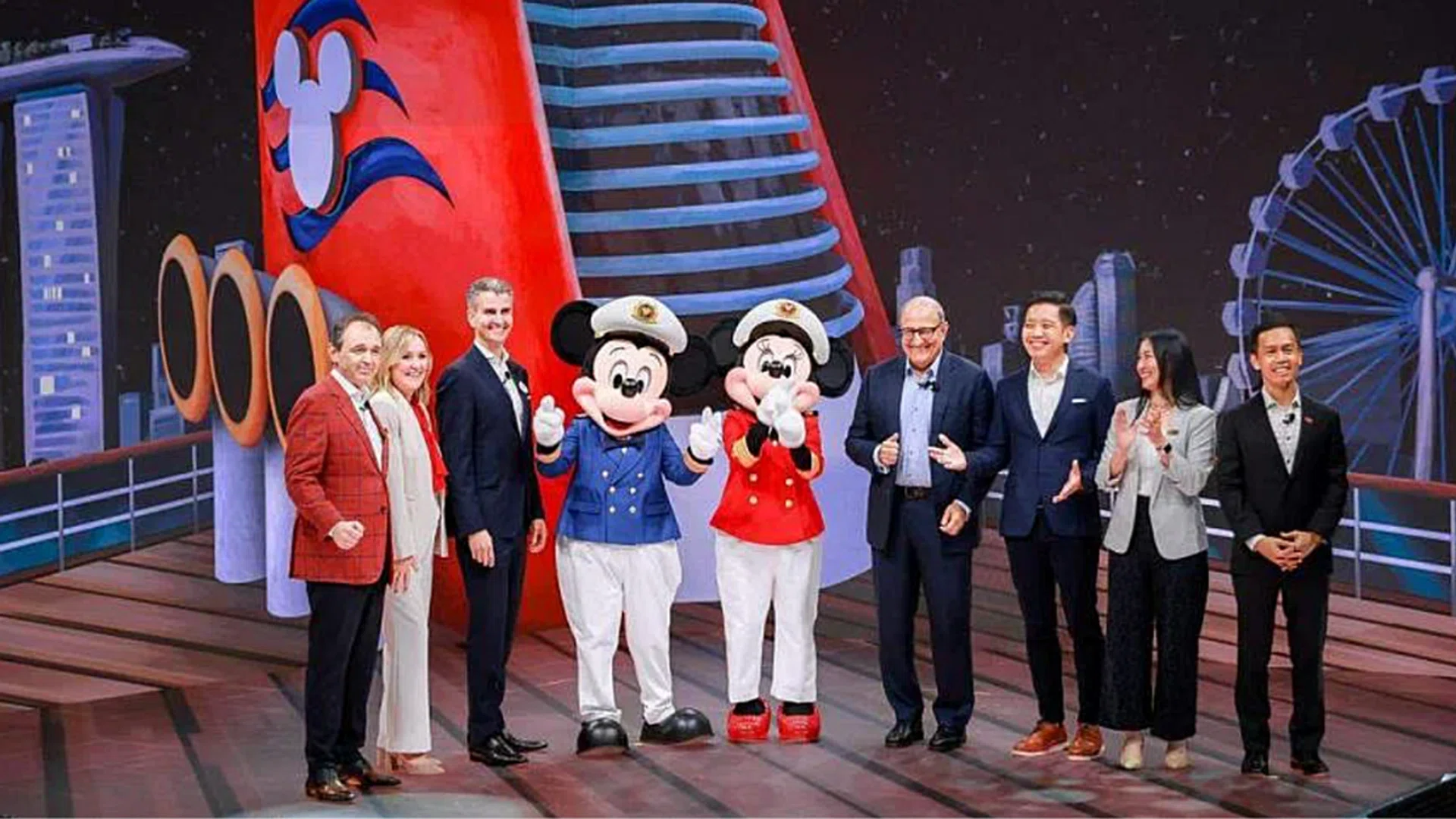 Transport Minister S Iswaran (fourth right) with Disney Parks, Experiences and Products chairman Josh D'Amaro (3rd from left) at the launch. With them is , Minister of State for Trade and Industry Alvin Tan (third right) and STB CEO Keith Tan (right). ST Photo: Gavin Foo