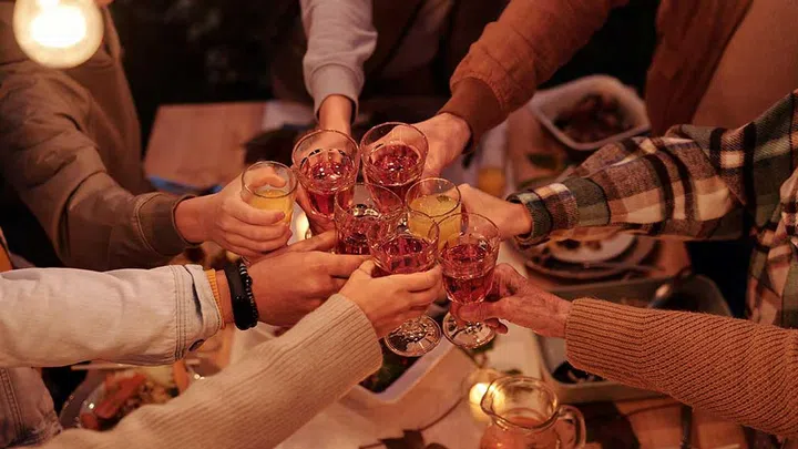 Research shows when people drink they usually eat more calories and move less. (Photo by Askar Abayev from Pexels)