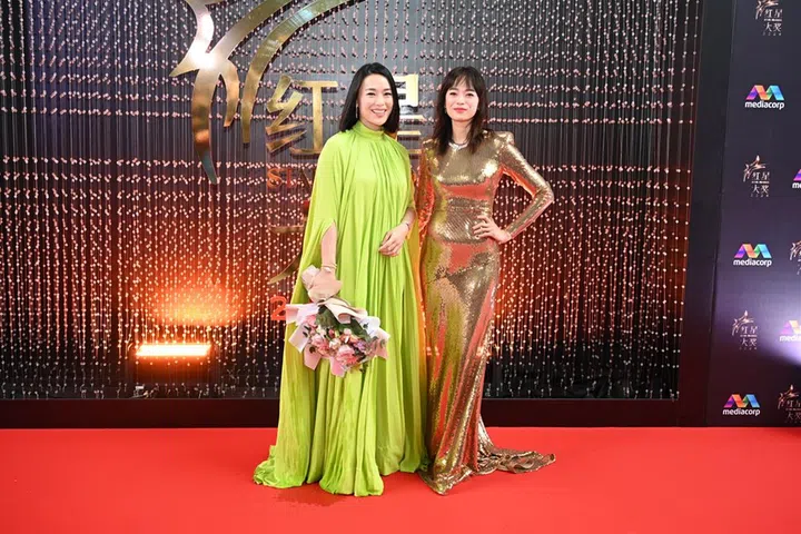 Rebecca Lim (left) at the Star Awards 2024 with Felicia Chin