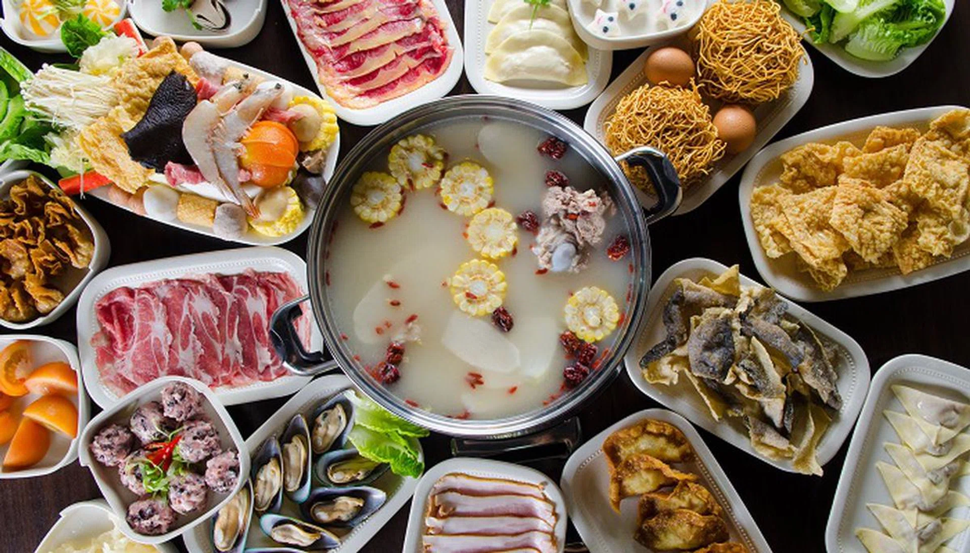 47545427 - chinese style hot pot soup with wide variety of ingredients