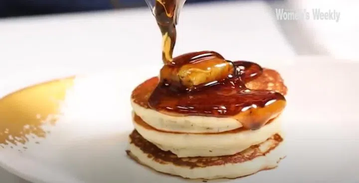 01. Stack pancakes and serve warm with butter and maple syrup.
01.  