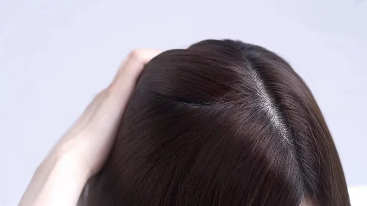 Daily heat styling can lead to weakened hair shafts and color fade, making the right temperature-controlled tools essential for healthy hair. Credit: Panasonic