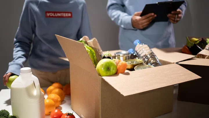 Volunteering and philanthropy have been shown to have positive effects on your wellbeing. (Photo by cottonbro from Pexels)
