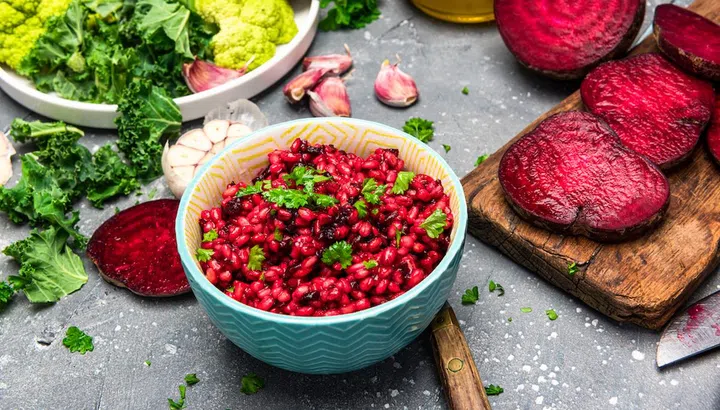 Cooking Vegetarian Plant Based Food. Buckwheat Groats with Beetroot and Parsley.