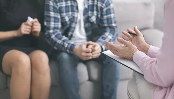 Relationship analysis. Psychotherapist talking with patients, discussing problems of their family