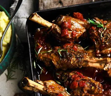 Tomato-Braised Lamb Shanks With Creamy Polenta