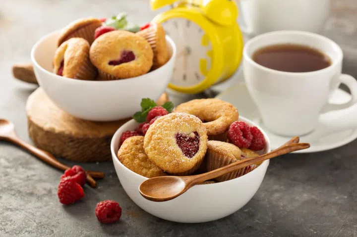 Mini raspberry muffinswith sour cream for breakfast