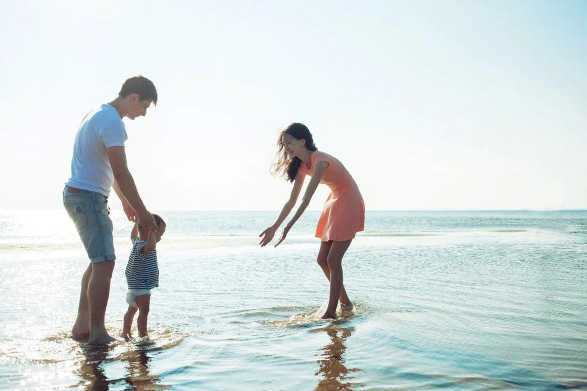 Asian family on the beach