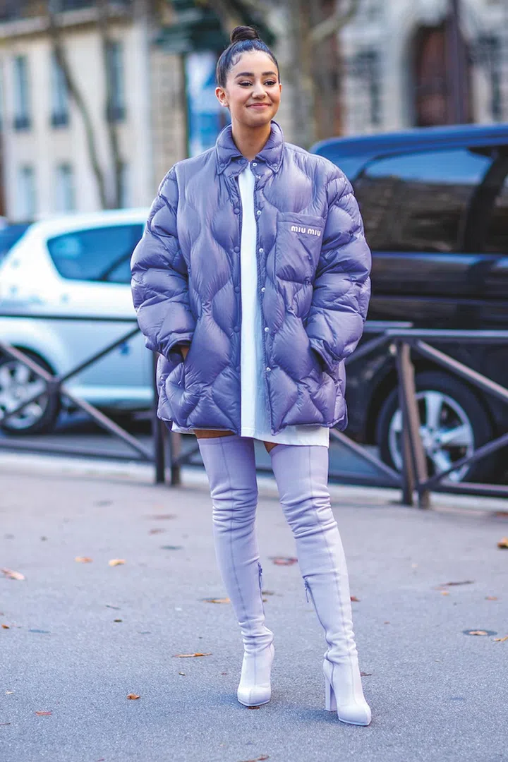 A fashion person in a Street Style photo out of Miu Miu Spring Summer 2022 Women Ready to Wear Fashion Show on October 2021 in Paris, FR