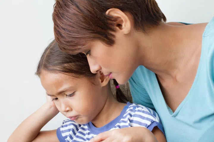 child's problem with caring mother; listening to her daughter's problem : head and shoulder shot