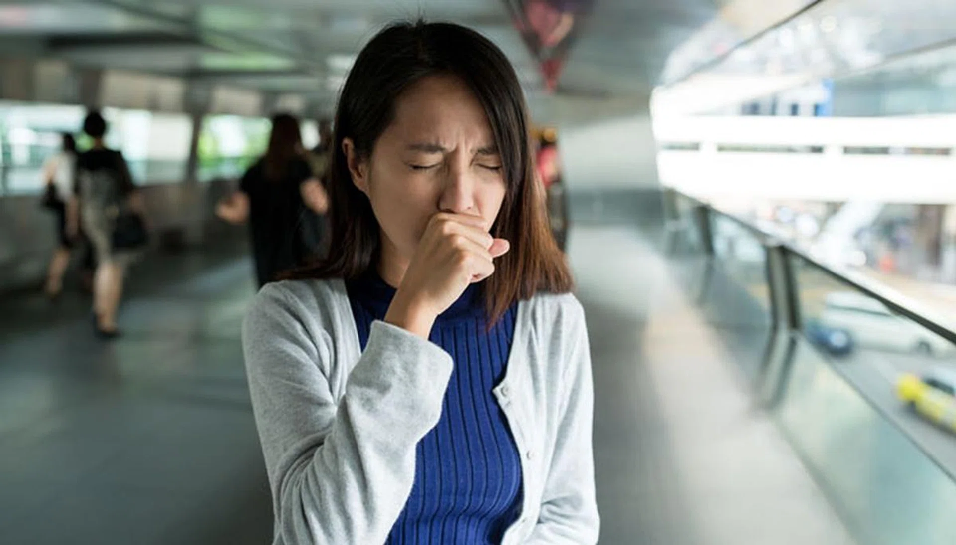 60608602 - woman cough at outdoor