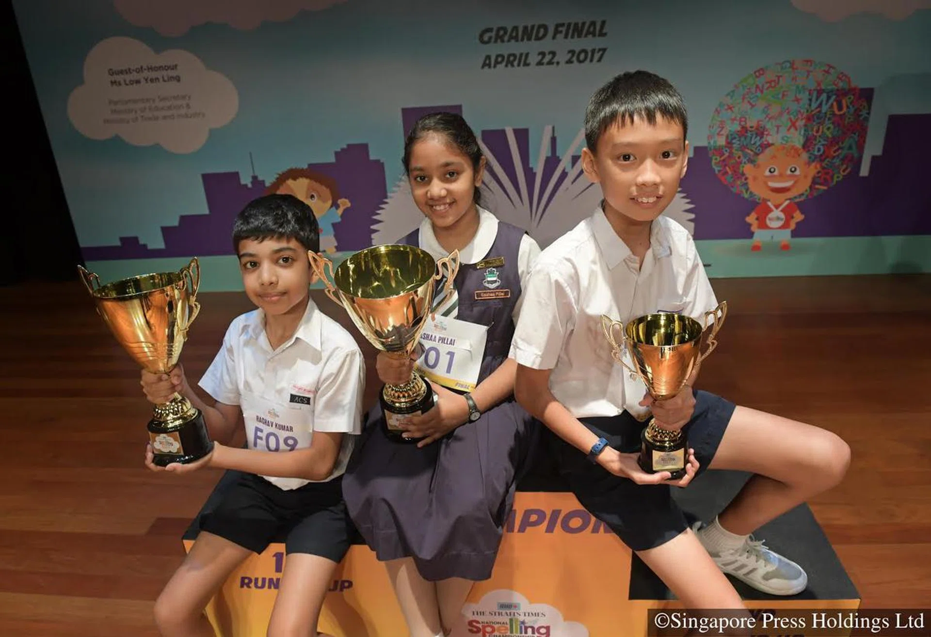 (From left) Raghav Kumar (first runner-up), Eashaa Pillai (winner) and Lee I-Shiang (second runner-up) at the final round of the RHB-The Straits Times National Spelling Championship on 22 April 2017.