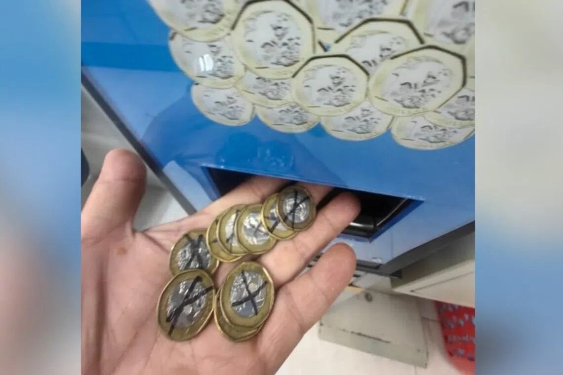 自助洗衣店硬币画“X”引关注业者：防换币机被滥用| 联合早报