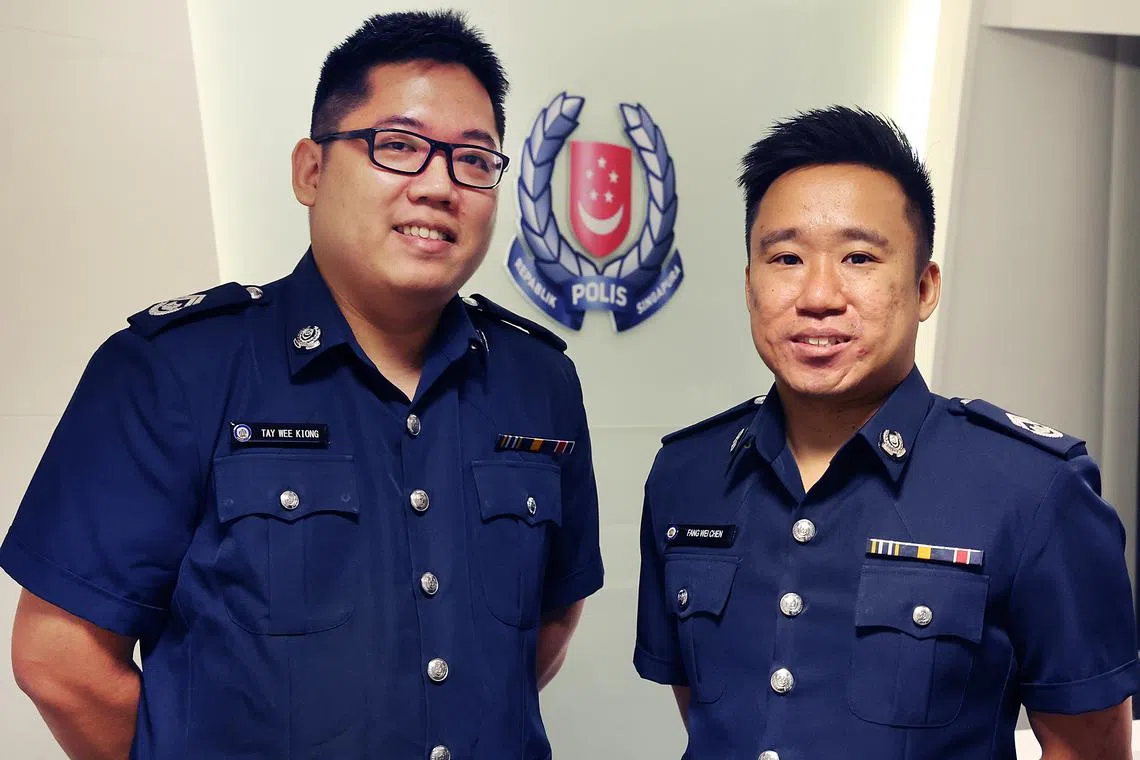 郑伟强警长（左）与方伟臣警长在所属小组内有多年办案经验。（ 蔡振鸿摄）