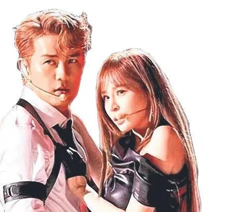 吴克群和王心凌，台上台下都是最佳搭档。（取自网络）