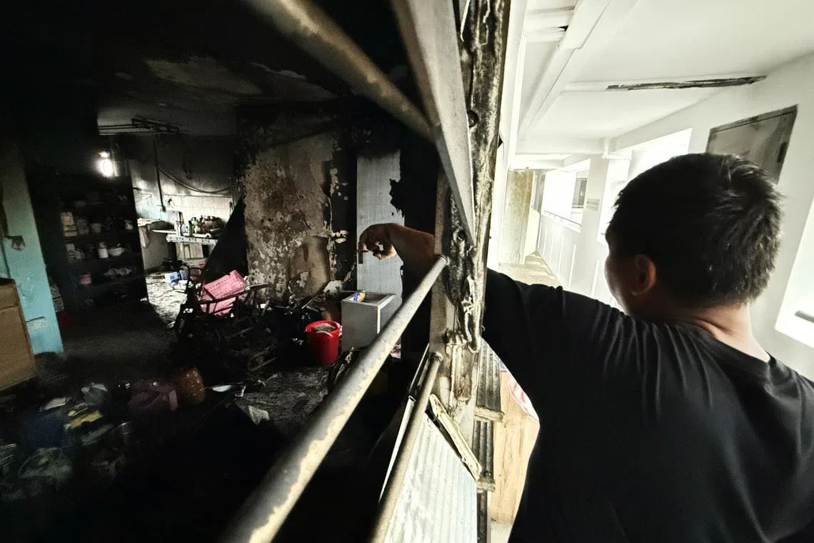 新年前遭遇祝融，让胡先生顿感失落。（纪允贤摄）