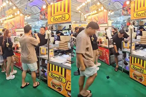 摊主营销手法惹议 摔手机拼买气