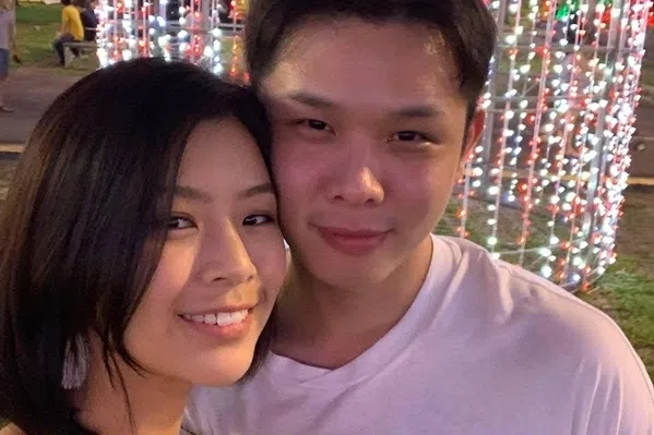 龙俊伟和未婚妻胡秀惠。（档案照片）
