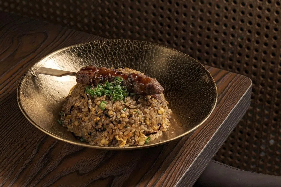 和牛炒饭的米饭粒粒分明。（餐馆提供）