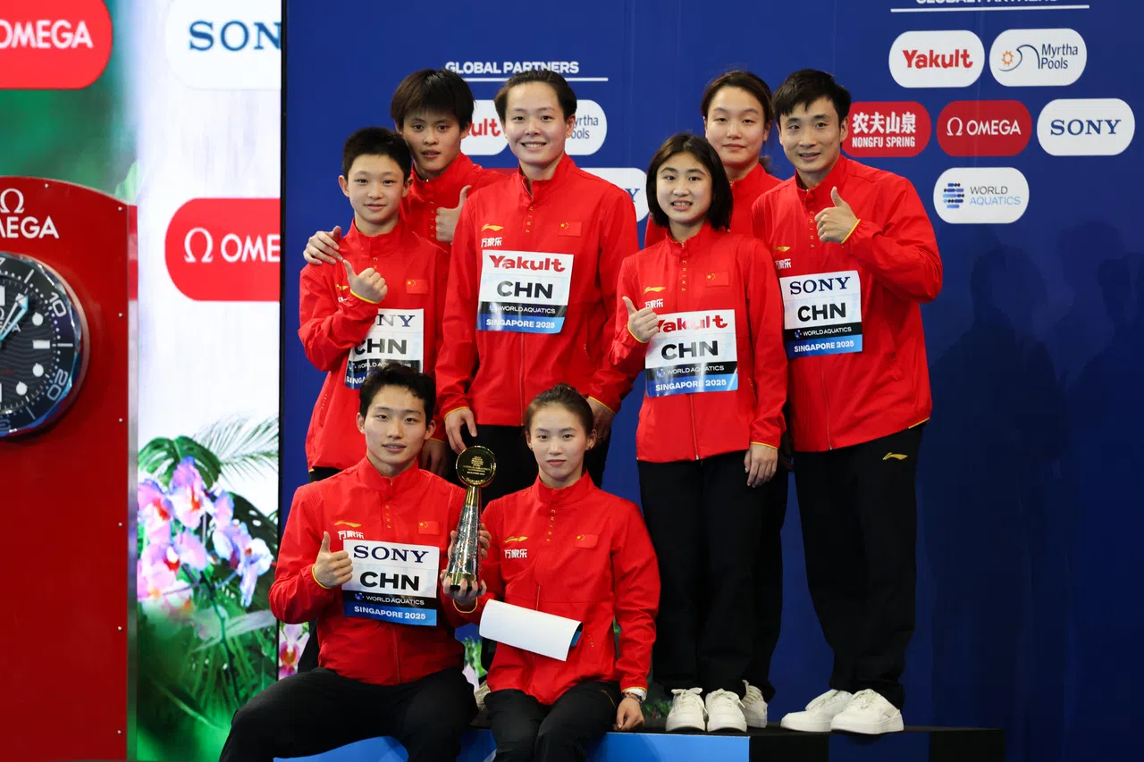 中国凭借着九枚金牌拿到本赛事的“最佳跳水队”奖项。（关俊威摄）