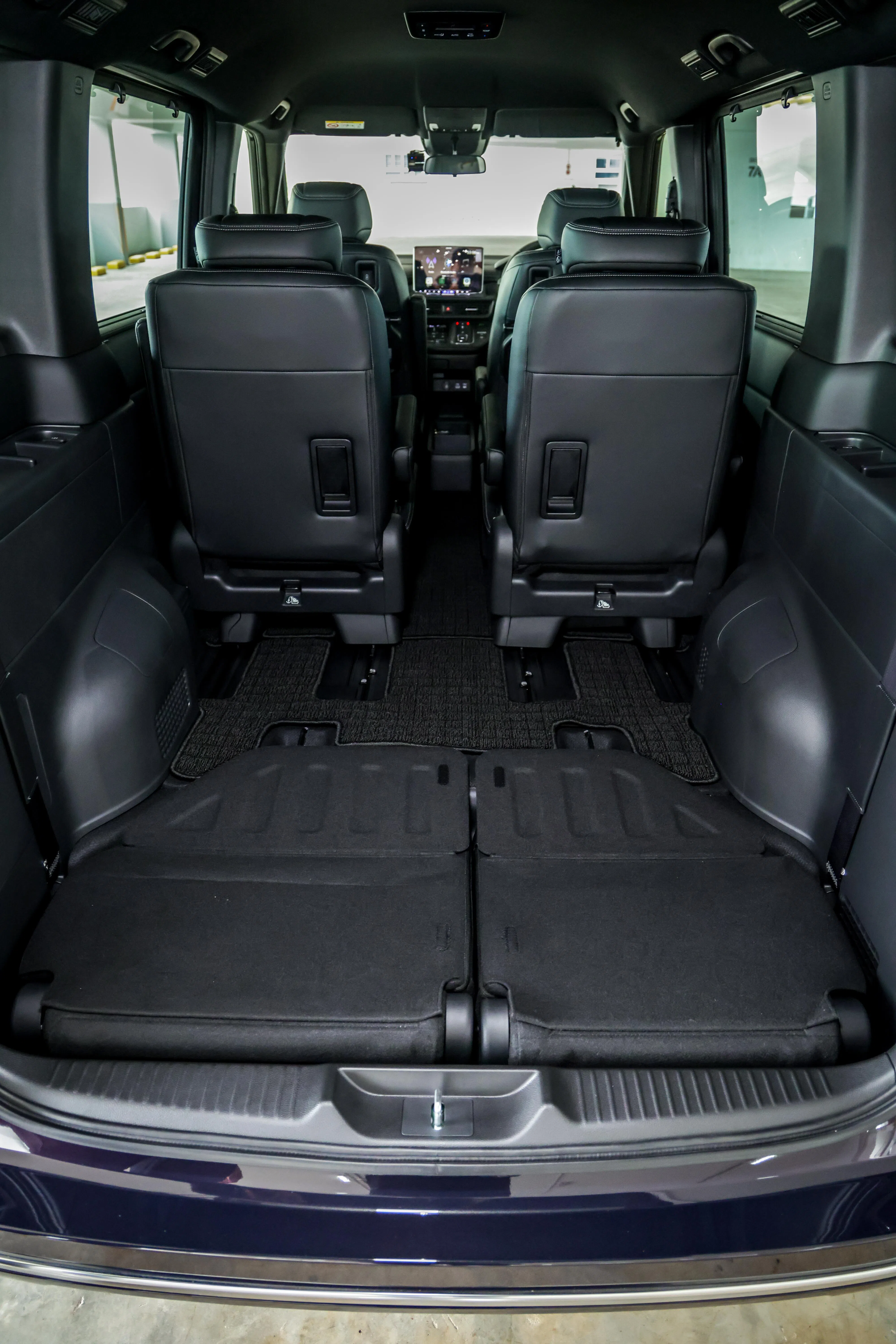 第三排座椅可收至地板下，形成平坦载物空间。（叶振忠摄）