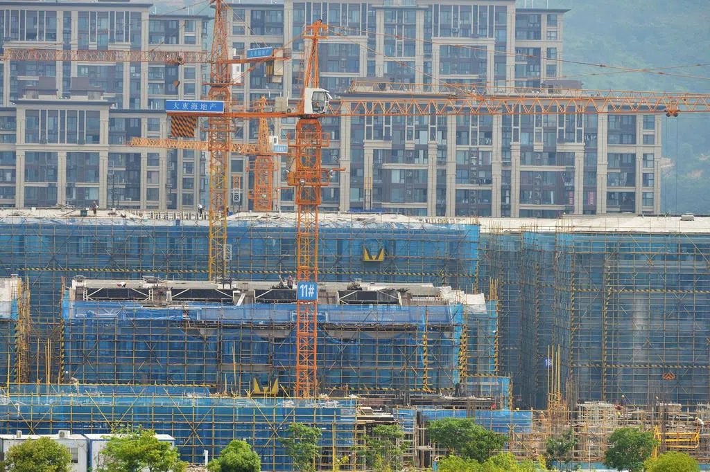中国多地烂尾楼业主停还房贷风波蔓延 监管部门传紧急开会应对 | 联合早报