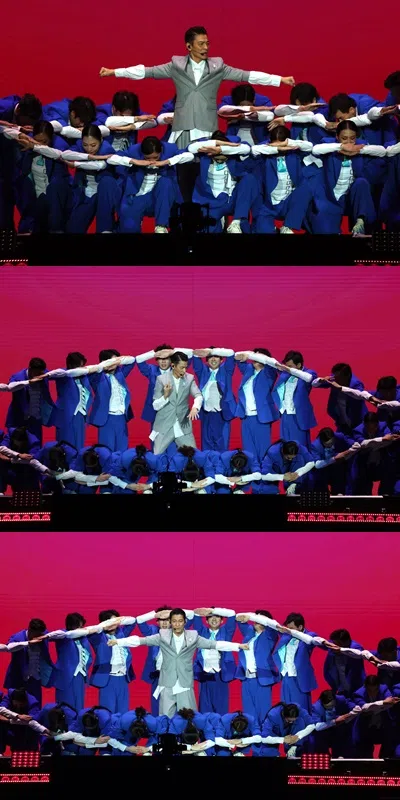 刘德华和舞群形成有趣的视觉效果。（邝启聪摄）