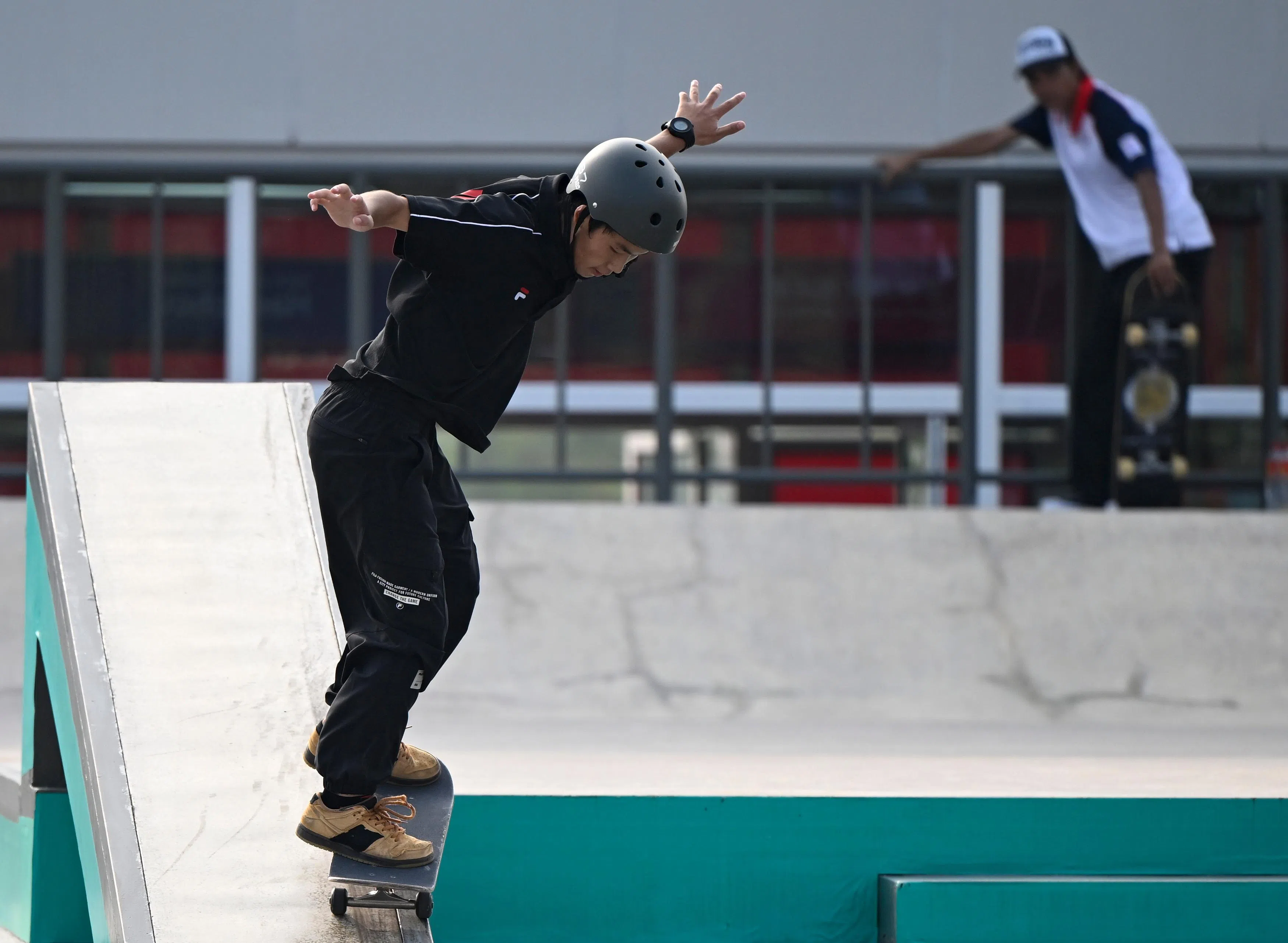 张杰为中国拿下本届亚运会滑板第三金。（新华社）