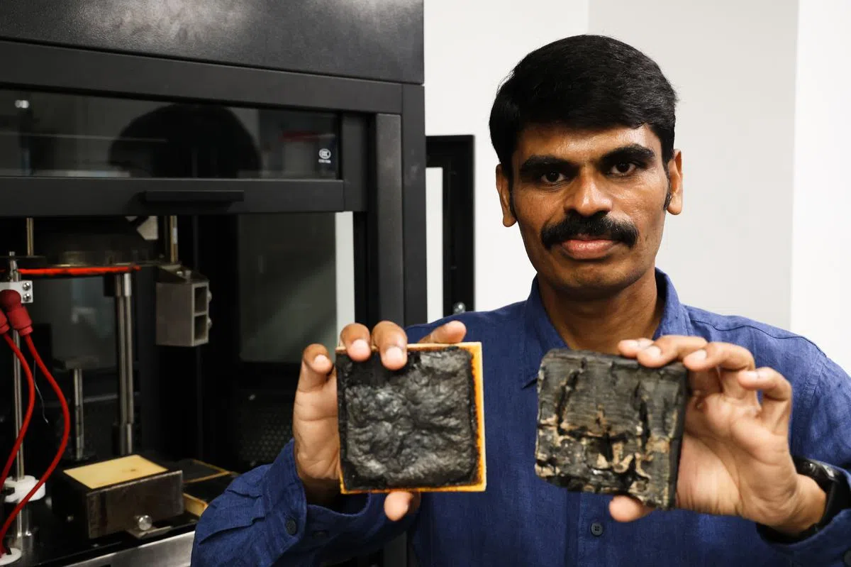 领导研究的南大材料科学与工程学院副教授达萨里说，涂上透明涂层的木材（左）可有效防火，避免木材结构被侵蚀。（蔡家增摄）