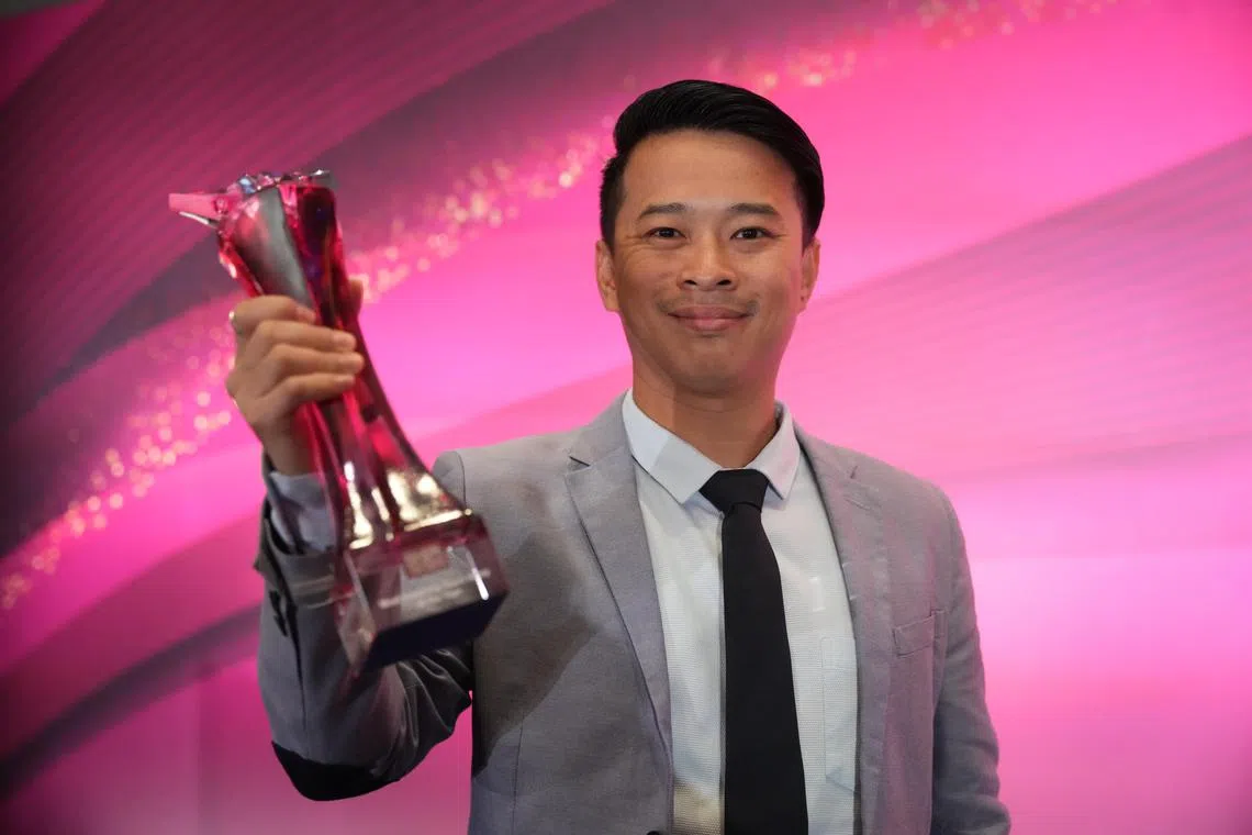 《海峡时报》体育记者李仕健首次赢得最激励人心体育新闻奖项。（谢智扬摄）