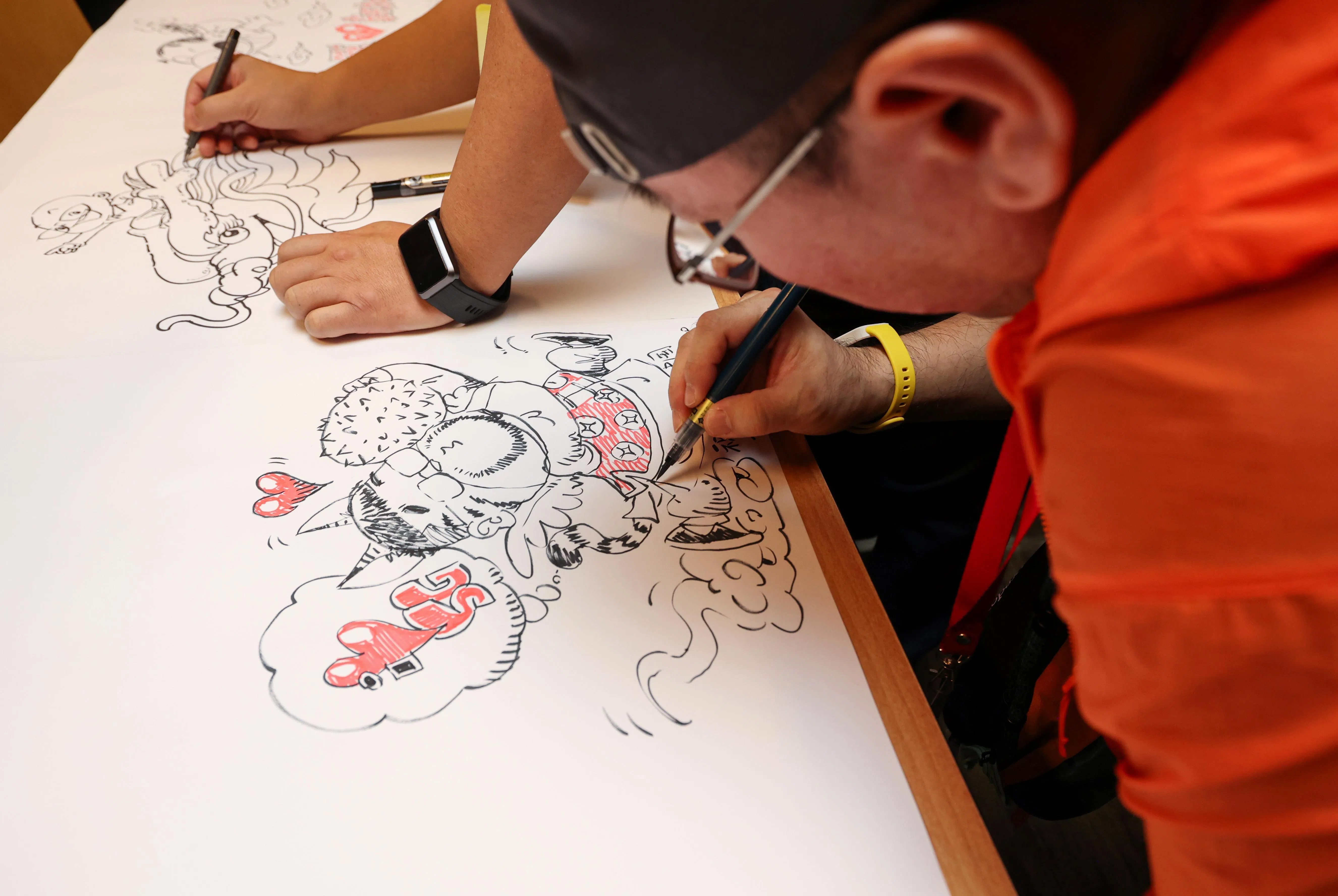 中国漫画家郜欣创作新中漫画图像，图中有榴梿和“love SG”字样。（游甯稀摄）