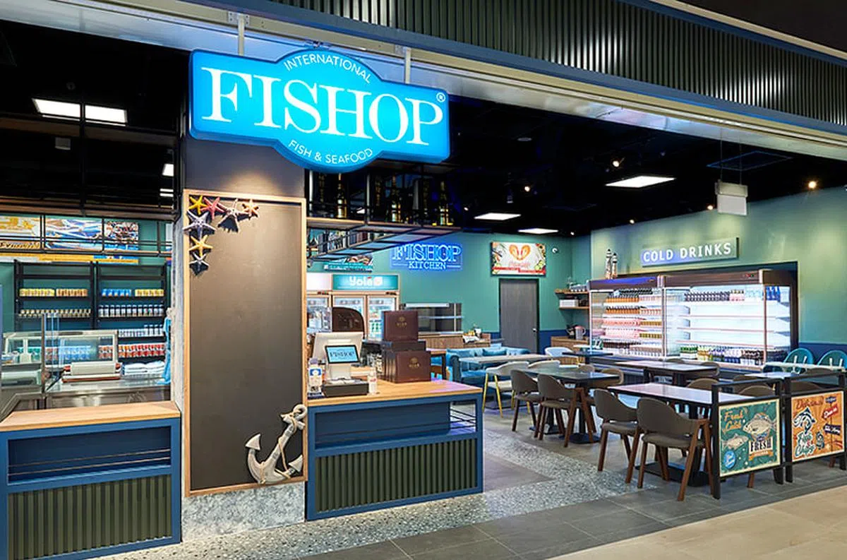 这个名为“FISHOP”的新店是公司在本地的第一个结合直销和餐饮的零售店面。（图／新报业媒体）