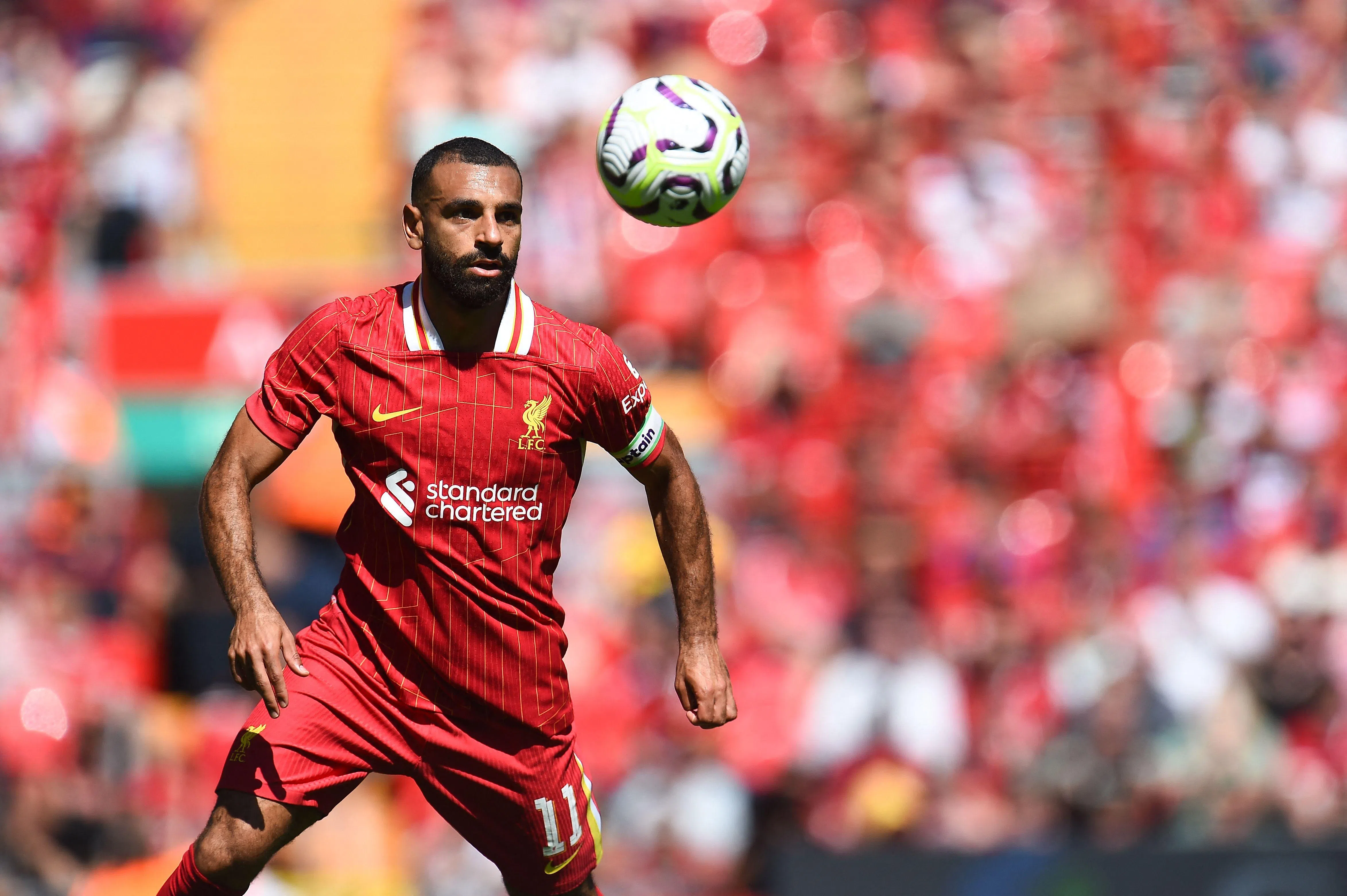 利物浦的埃及球星萨拉赫告别标志卷发，剃短发来迎接新赛季。（法新社）