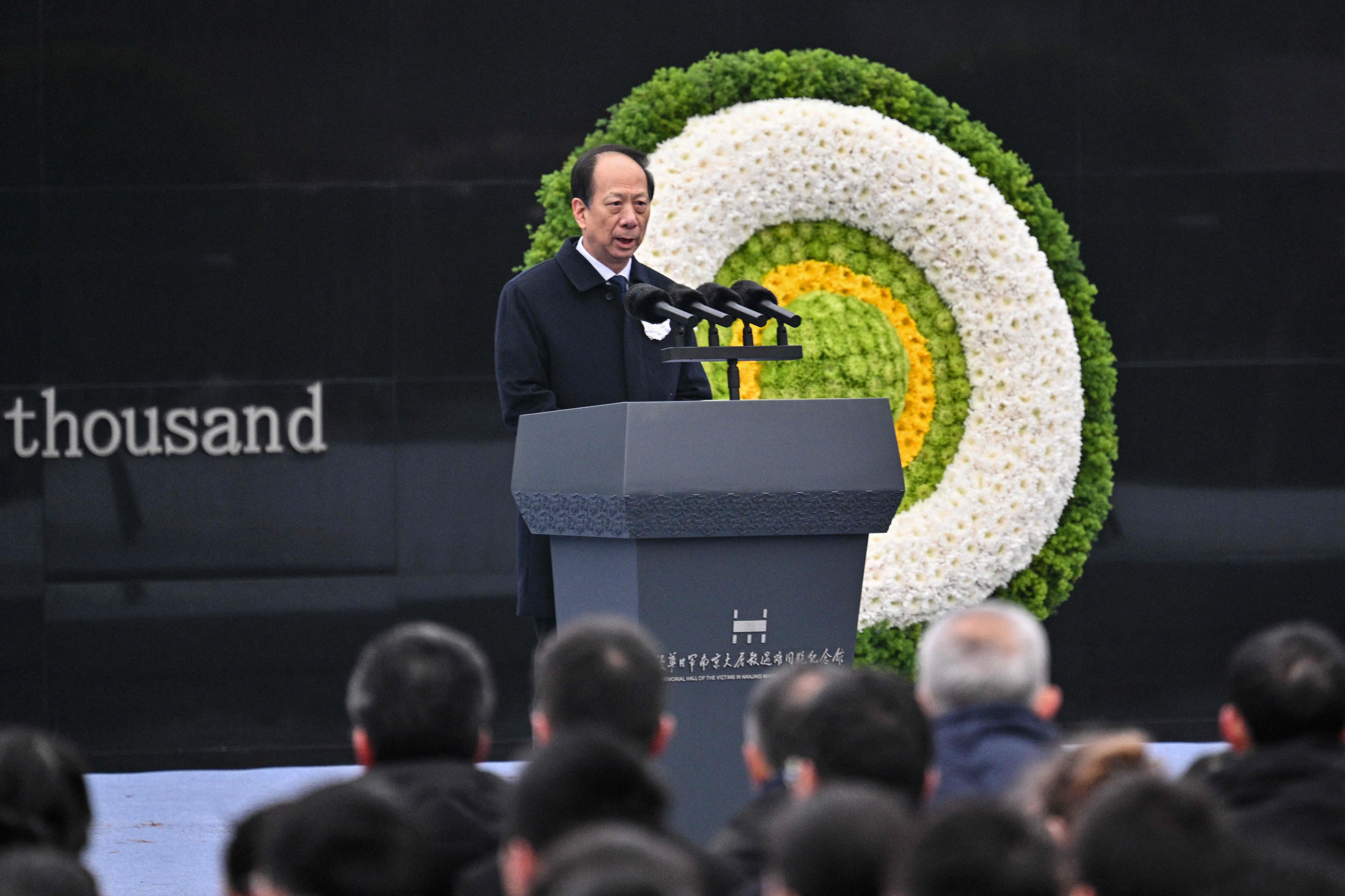 中共政治局委员、中组部部长石泰峰星期六（12月13日）出席南京大屠杀死难者国家公祭仪式并讲话。（法新社）