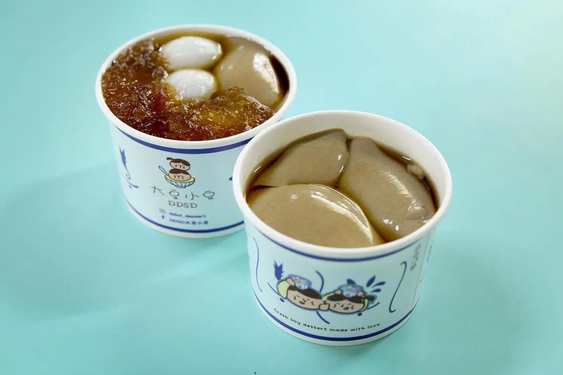 大豆小豆将咖啡与豆花两大传统元素巧妙融合，每一口都是咖啡香和豆香的完美碰撞。（龙国雄摄）