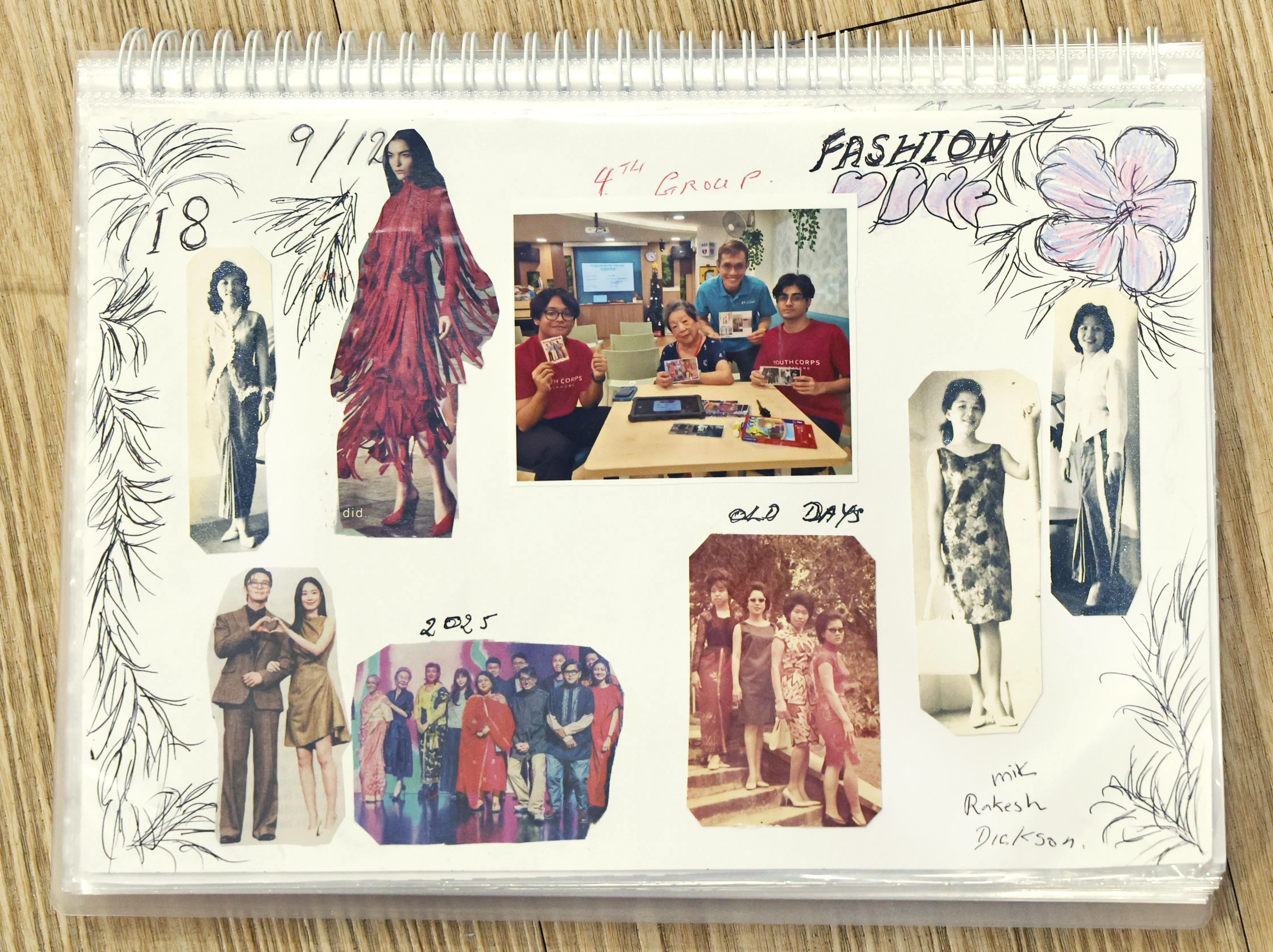 杜慧坤用心把旧照片放入剪贴簿，并自己画上插图。（周国威摄）