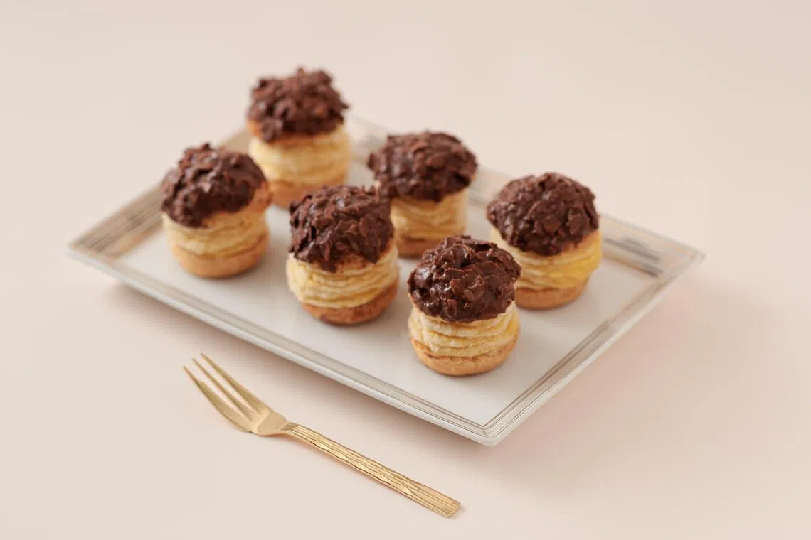 猫山王巧克力泡芙结合榴梿和巧克力的香甜。（酒店提供）