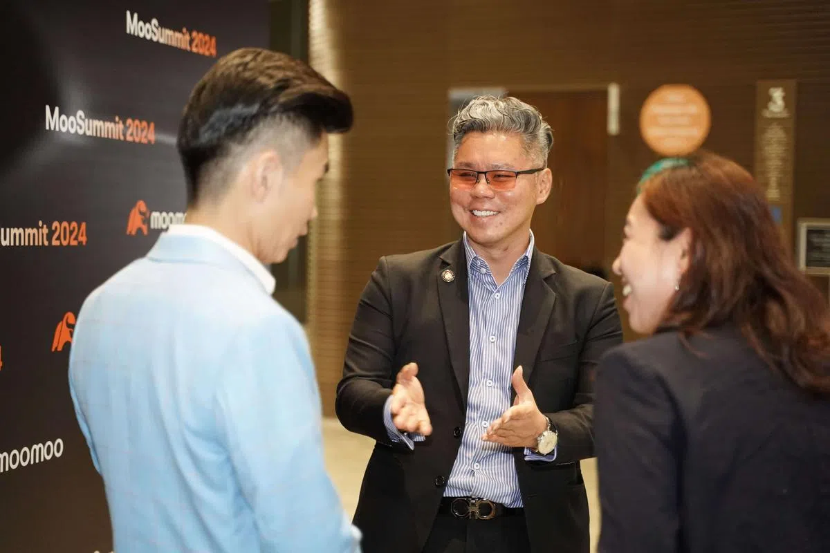 谢瑞业（中）希望通过交易技术和投资理念的持续创新，继续优化平台与服务，为客户带来更优质的投资体验。（图/商家提供）