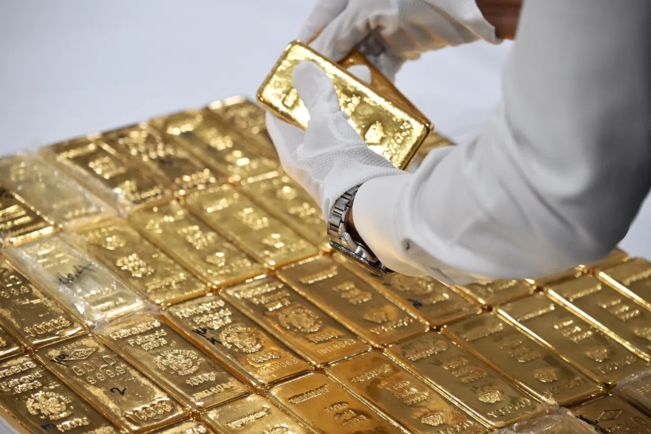 1公斤重的金条，目前市价约14万元。警方共移交58块金条给资产管理公司处置。（海峡时报）