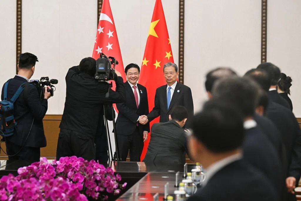 黄总理：新中关系处于极佳状态  盼加强自贸港联系