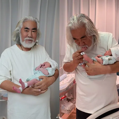 张纪中抱着新生宝宝，一脸慈爱。（取自张纪中微博）