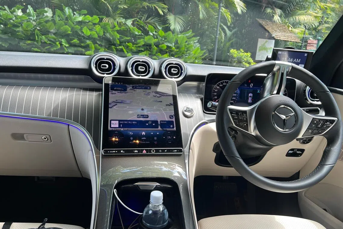 车室配备12.3英寸全液晶仪表与11.9英寸纵向中控屏，设计现代直观。（吴庆康摄）