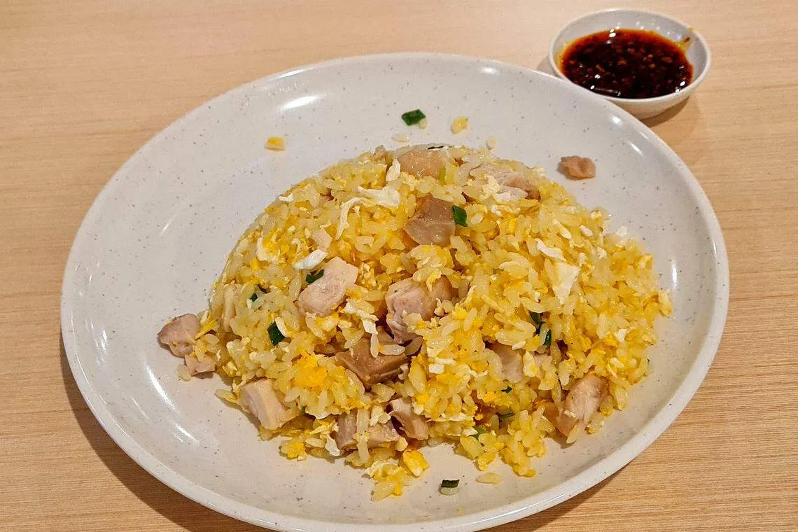王厨蛋炒饭镬气四溢，米粒金黄分明，鸡蛋分布均匀，充满蛋香。（叶晓虹摄）
