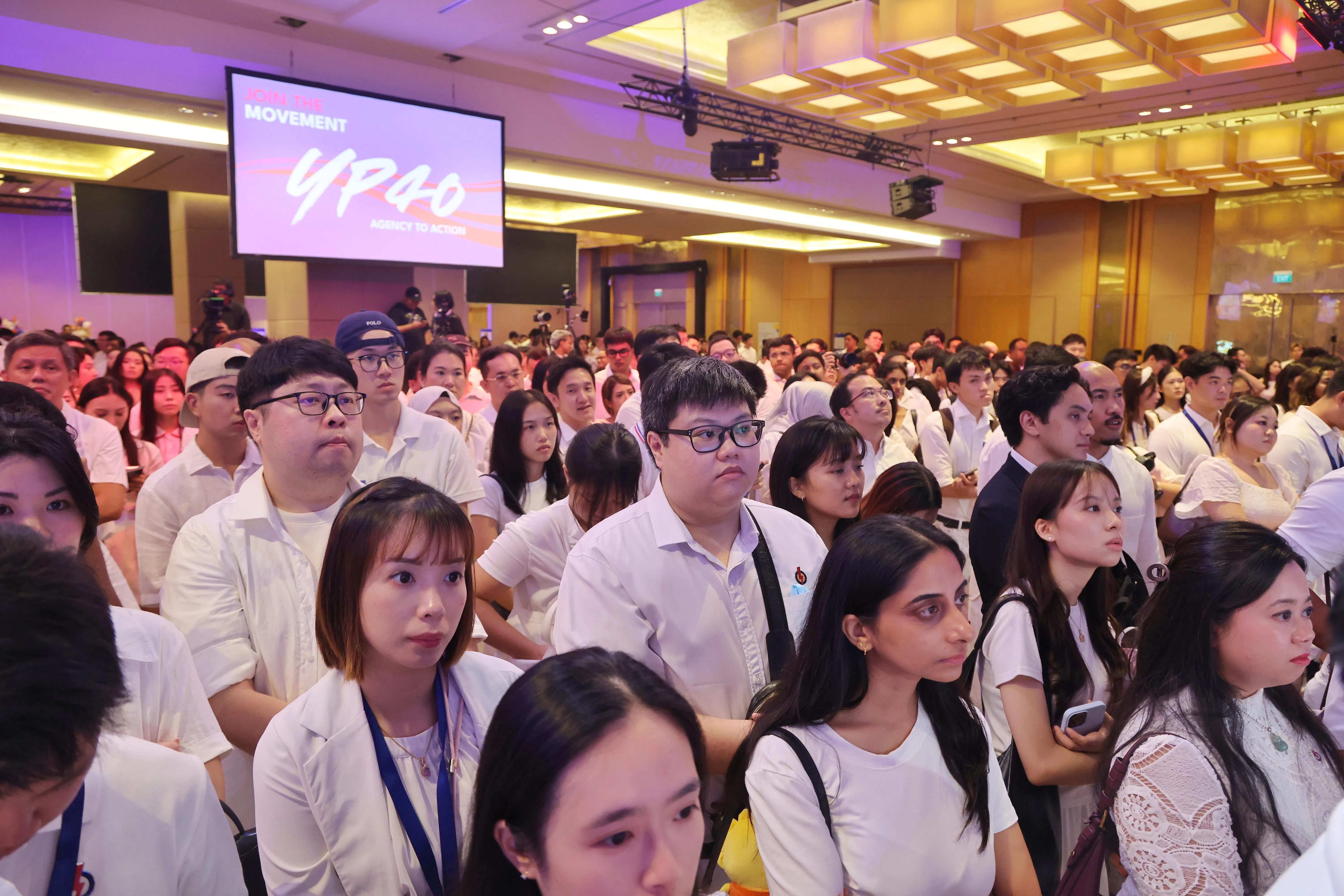 行动党青年团星期六在滨海湾金沙会展中心举行YP40嘉年华，庆祝青年团成立40周年。超过1200名青年团成员与受邀者出席。（唐家鸿摄）