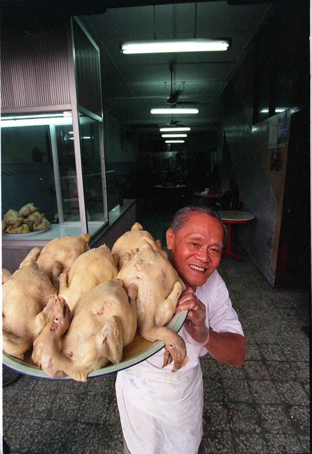 瑞记鸡饭的鸡只饱满结实，让老一辈食客至今念念不忘。（档案照片）